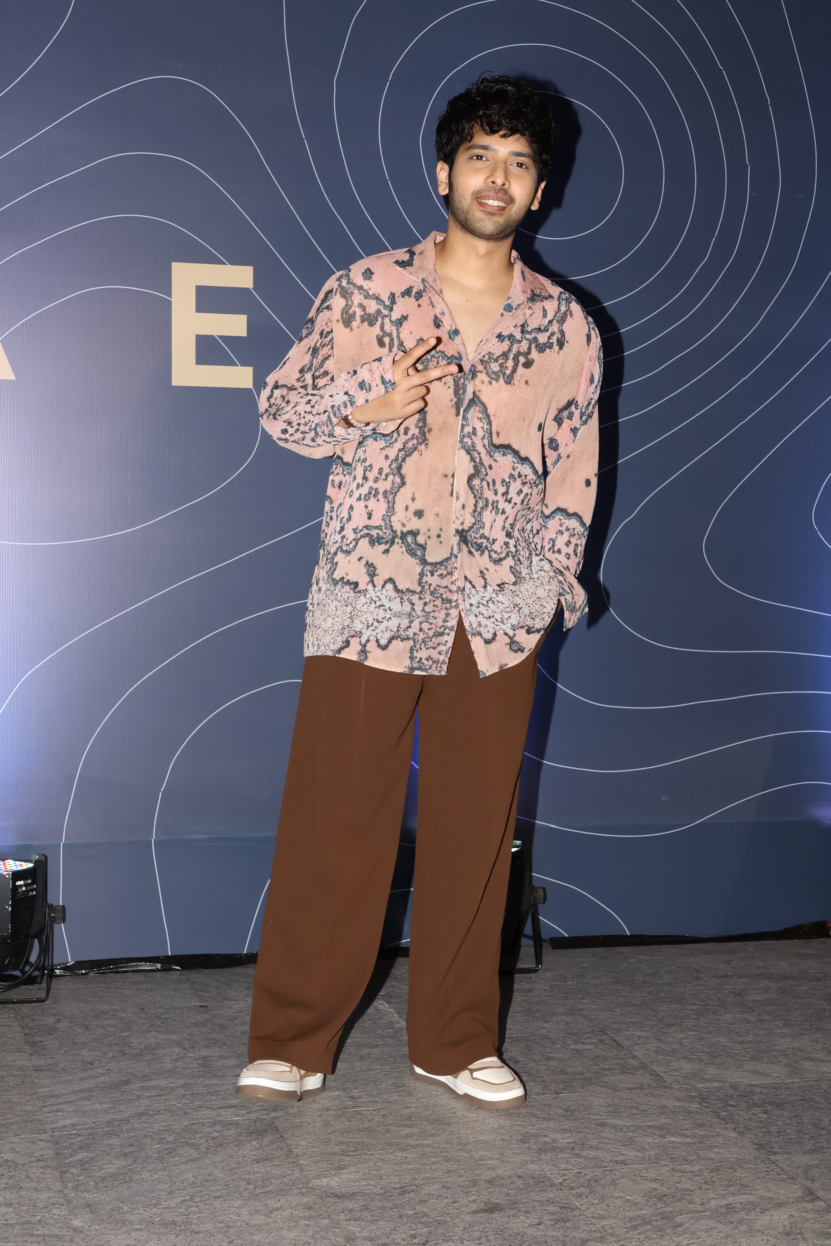 Armaan Malik's funky printed shirt brought such a fun element to the dress code of the night