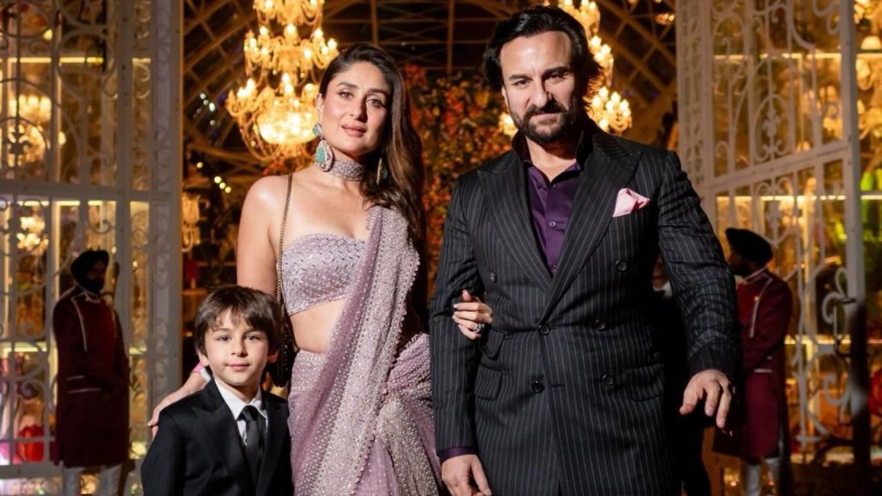 Bebo serves the ultimate apsara fantasty dressed in a silver bejeweled saree, while beau Saif and eldest son Taimoor rock black tuxedos 