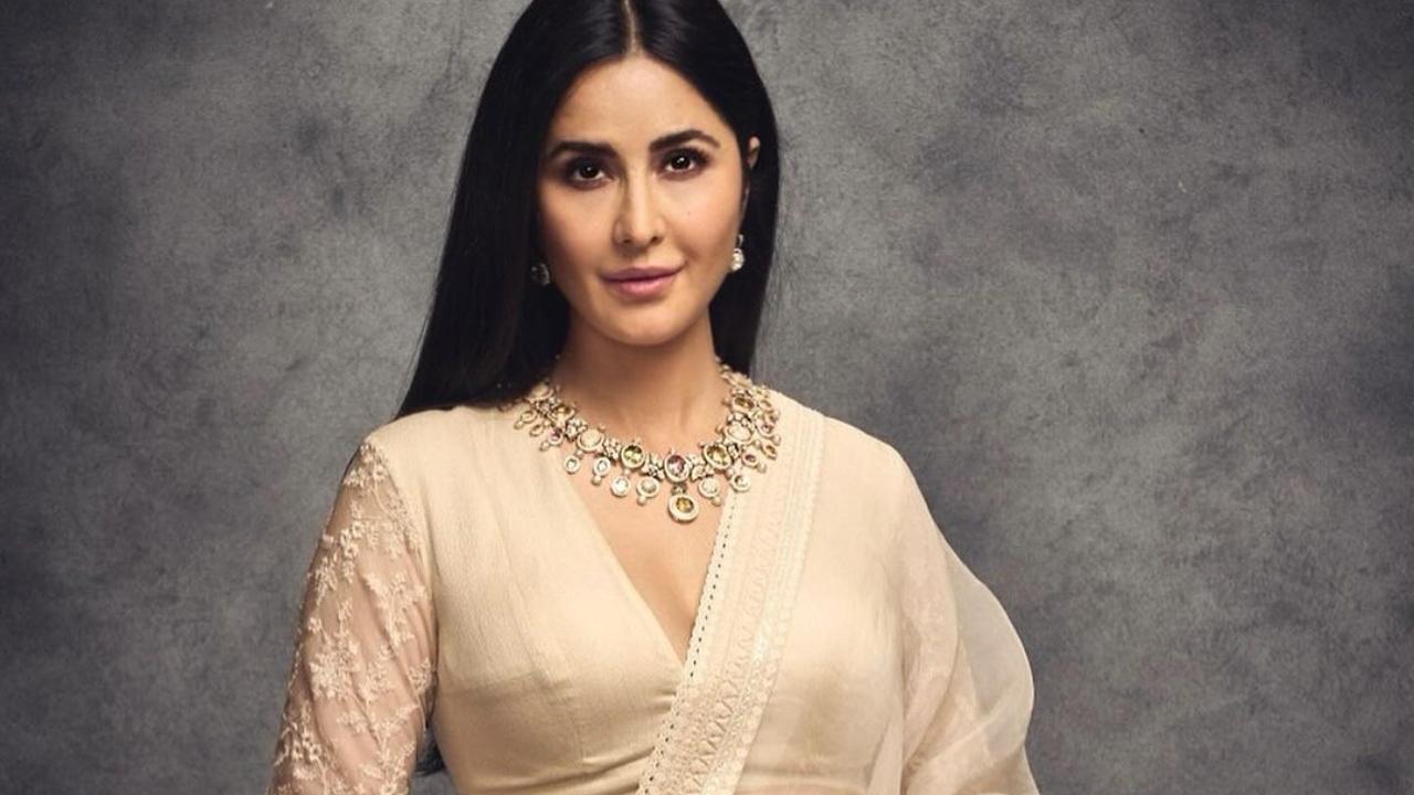 Katrina Kaif looked bespoke in a beige lehenga with a full-sleeves blouse. She opted for a choker necklace set in a similar shade and let her tresses down to complete the look. 
