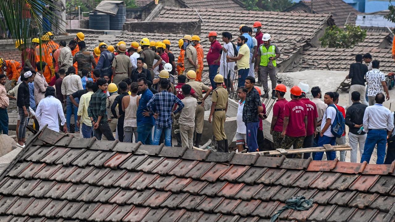 Rescue operation underway after a five-storey under-construction building collapsed at Garden Reach area of Kolkata in West Bengal. Pics/PTI