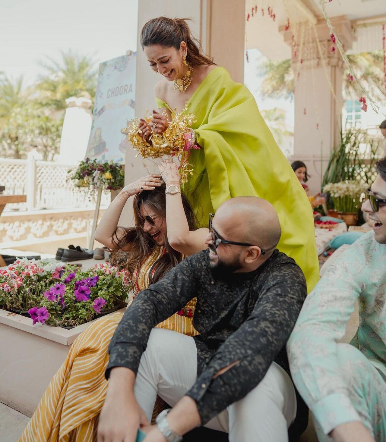 Kriti's photo album also showed her doing the chooda ritual on her family and friends where the bride shakes the kaleeras and whoever gets a piece fallen on their head is the next in line to marry. 