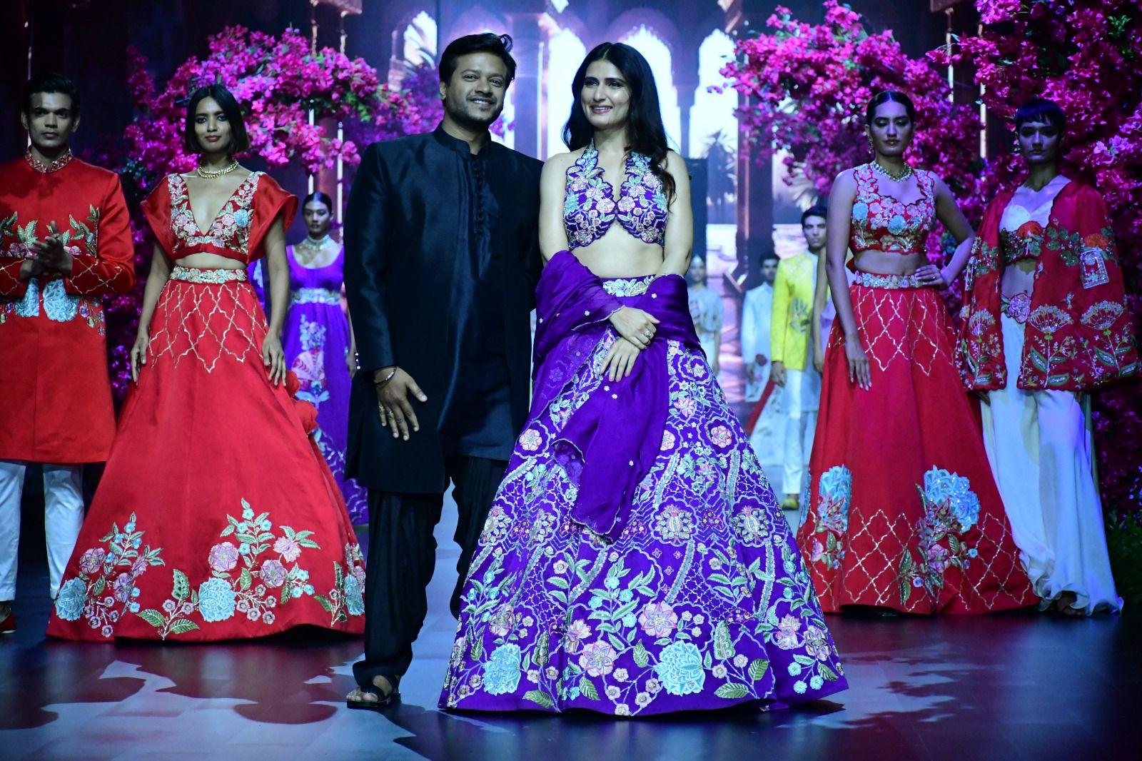  Her ensemble included a stylish purple outfit with floral embellishments, consisting of a chic top paired with an elegant skirt. Completing the look was a matching dupatta with beautiful embroidery.