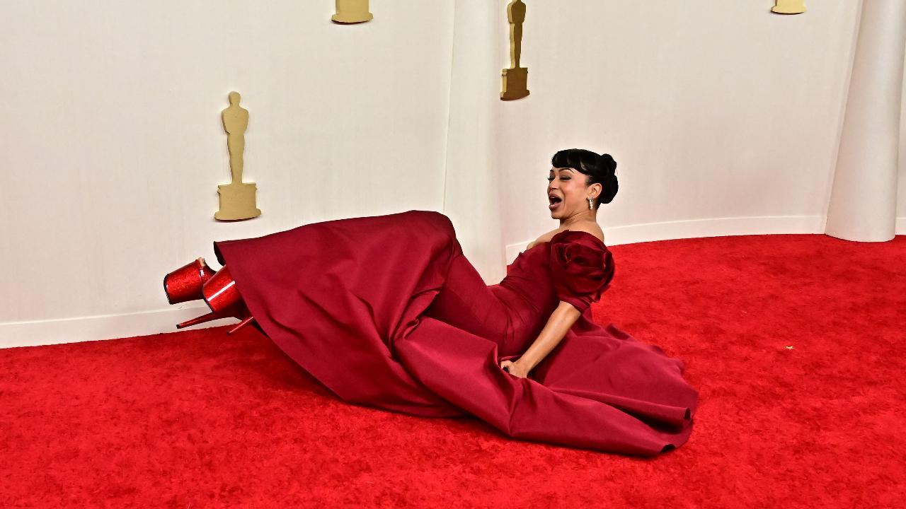 Oscars 2024: Liza Koshy takes a tumble on the red carpet