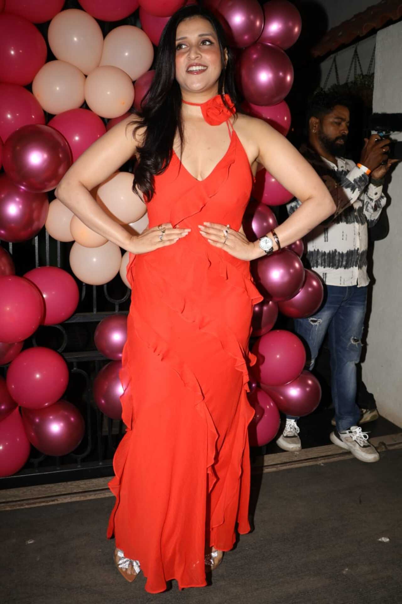 The former Bigg Boss contestant was seen in a stunning red dress for her party