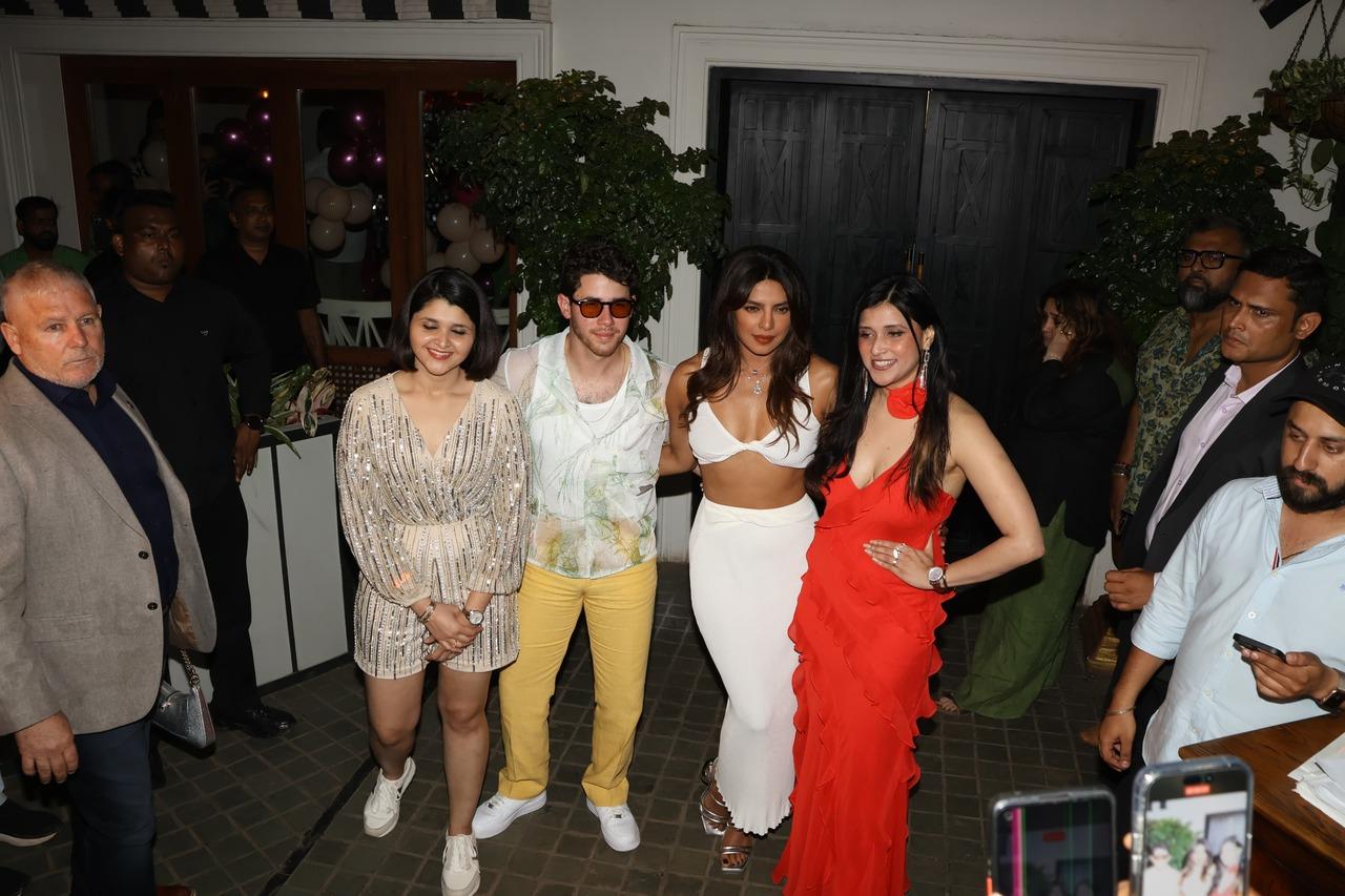 Priyanka looked smoking hot in a white bralette with matching skirt for the night. Meanwhile, Nick looked cool in yellow pants and a white shirt