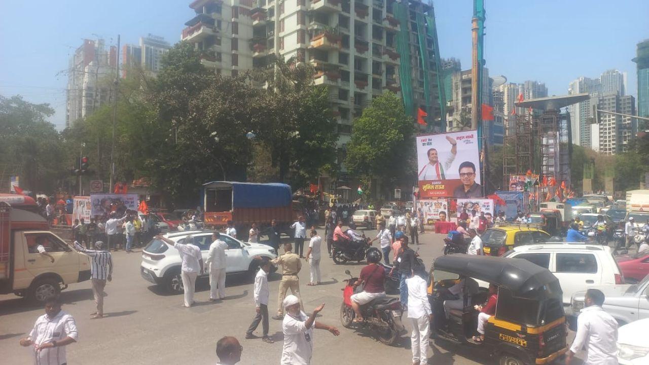 People stood on the road, eagerly waiting for the arrival of MP Rahul Gandhi at Mulund Bhandup Junction Labs Road on Saturday. Pics/ Sameer Syyed Abedi & Congress
