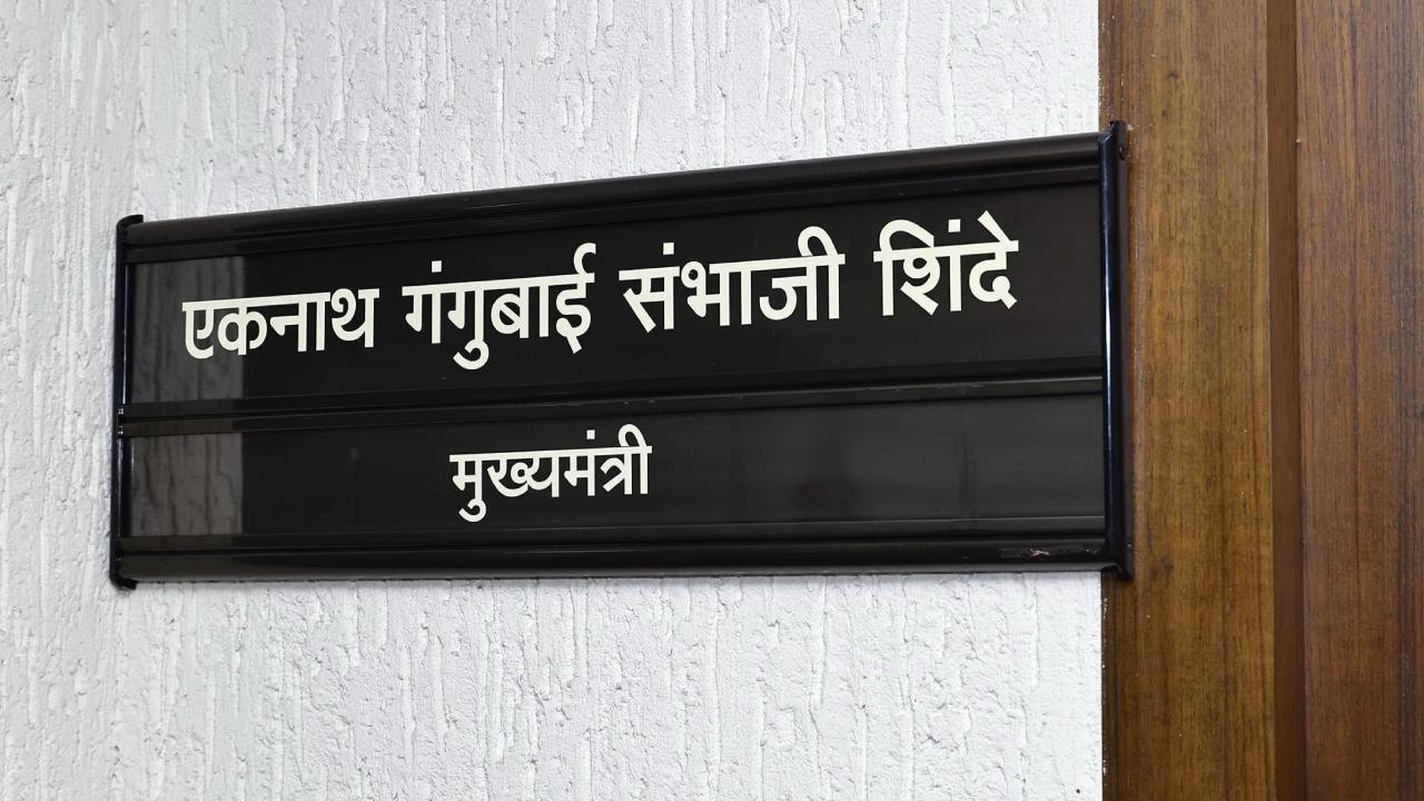 CM, both DCMs get revised name plates with mother's name added outside offices
