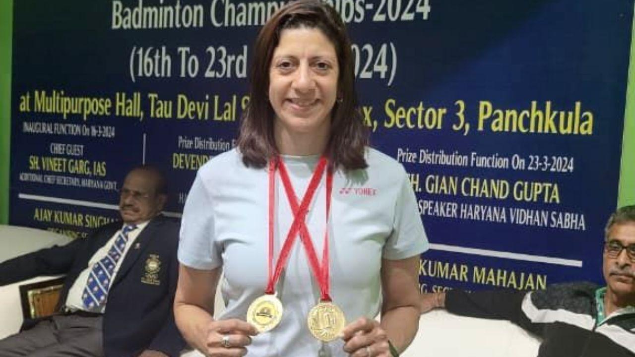 Maharashtra shuttler Naheed Divecha with the gold medals she won at the 46th Indian Masters National Badminton Championship at Panchkula recently. PIC/Divecha’s personal collection