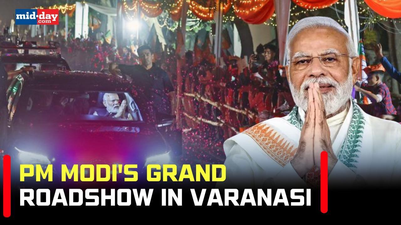 PM Modi holds 28-km grand roadshow in Varanasi, crowd showers flower petals