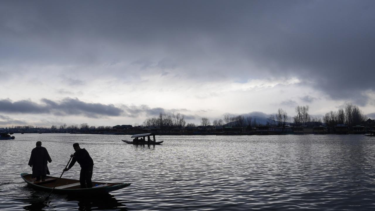 In Pics: Rains lash plains of Kashmir region