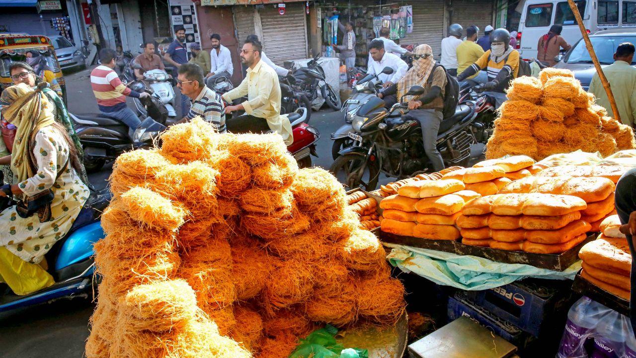 Vermicelli and other items are on sale in a market on the first day of Ramadan month, in Bhopal on Tuesday. (Photo by ANI ) 