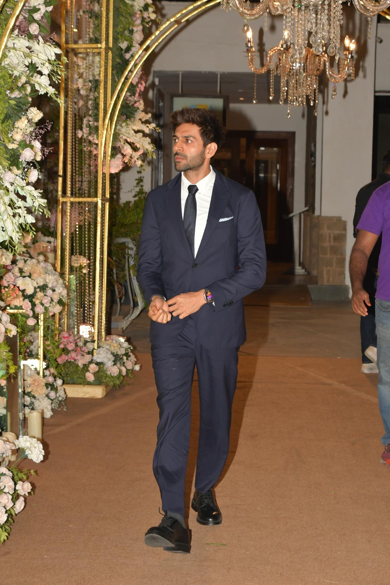 The actor posed for the paparazzi as he attended the function, looking stylish in formal wear