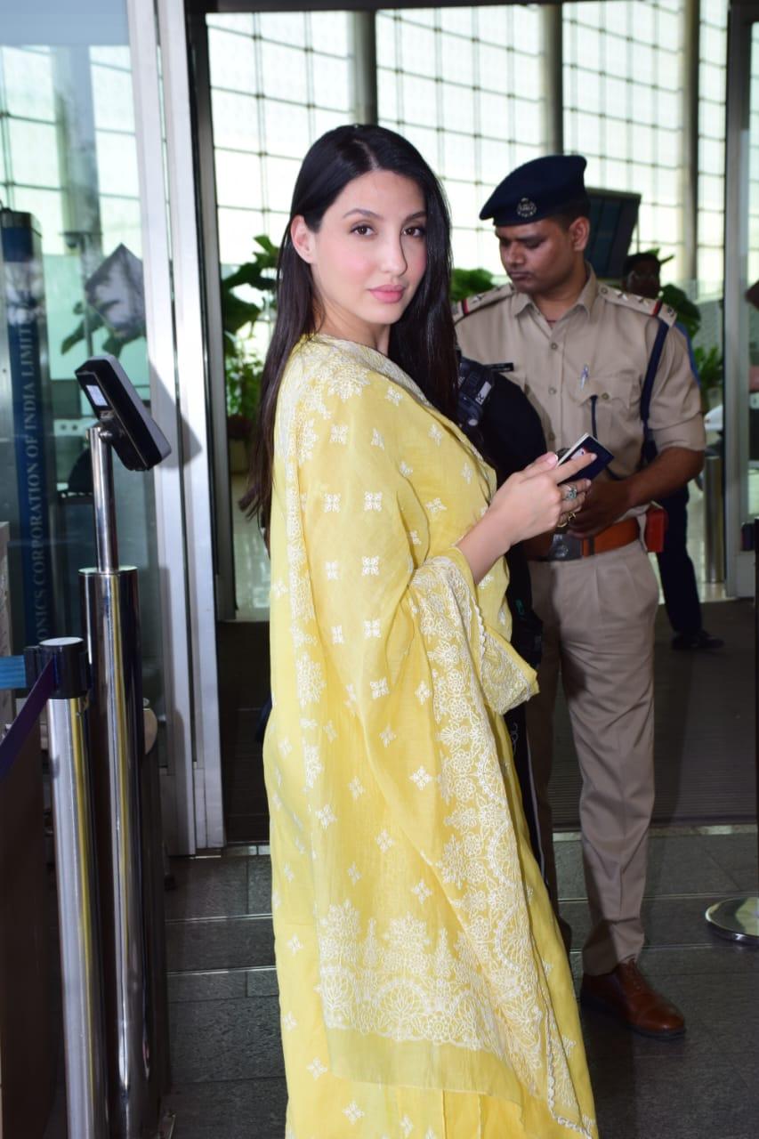 Nora Fatehi was snapped at the airport, wearing a stylish yellow chikankari suit 