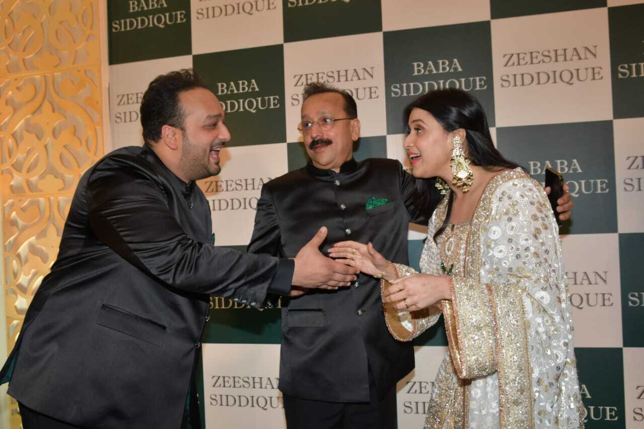 Mannara Chopra in a candid moment with Zeeshan and Baba Siddique