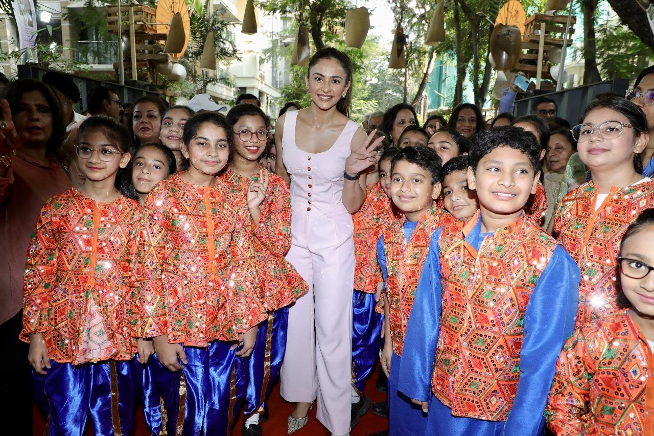 Rakul Preet Singh poses with kids at an event in the city