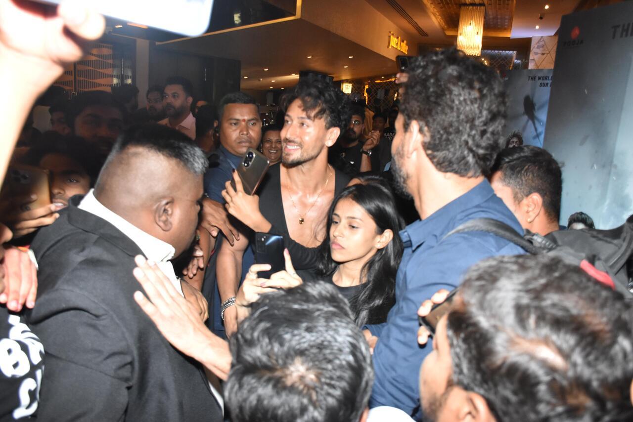 Tiger Shroff gets mobbed by fans at a theatre in the city after the trailer launch of Bade Miyan Chote Miyan