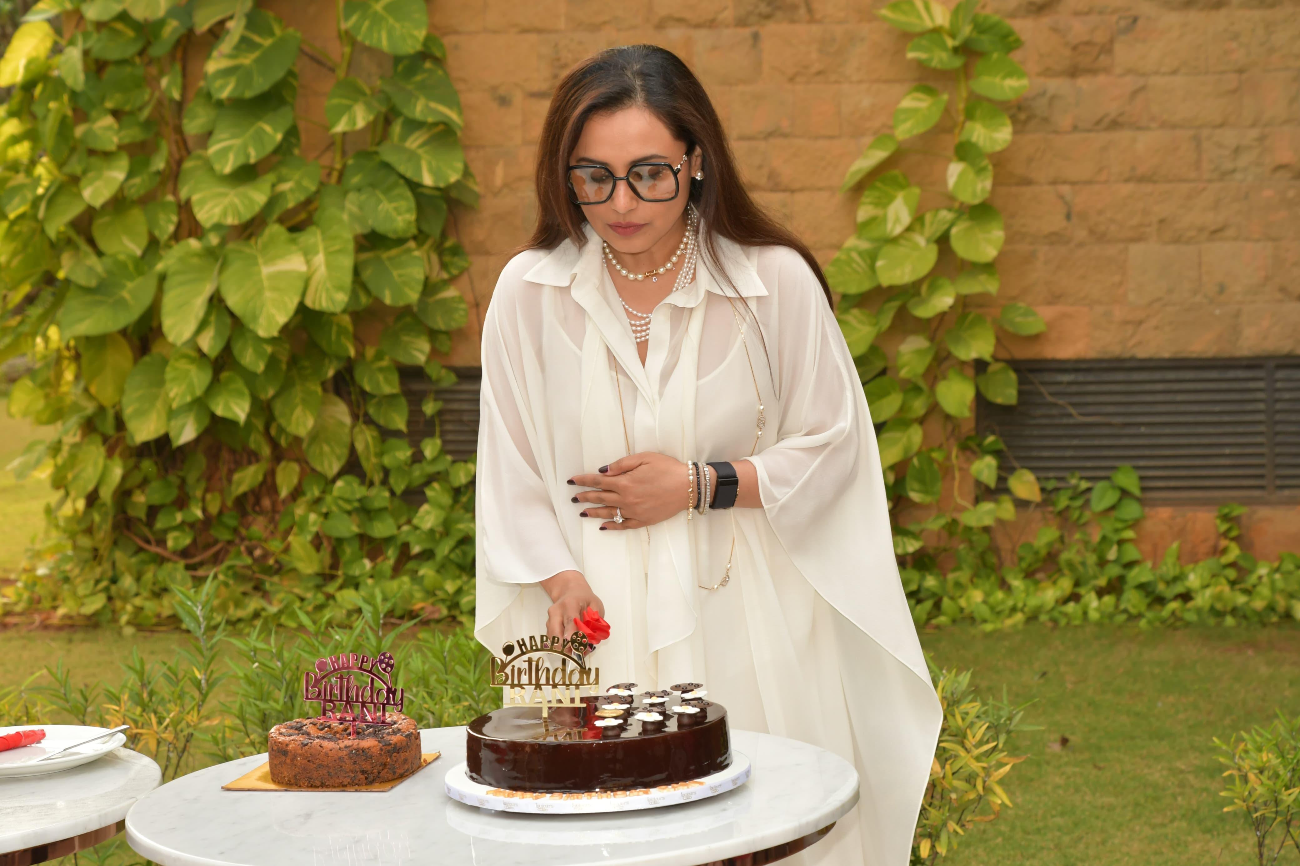 Rani Mukerji looked stunning and elegant in an ivory ensemble paired with a flowing cape as she celebrated her birthday by cutting a cake