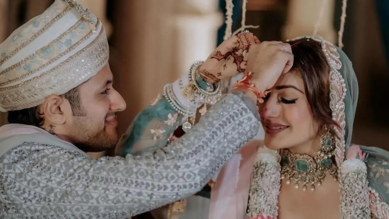 Surbhi Chandna took to her Instagram and shared a series of pictures from her grand wedding with Karan Sharma. Read full story here
