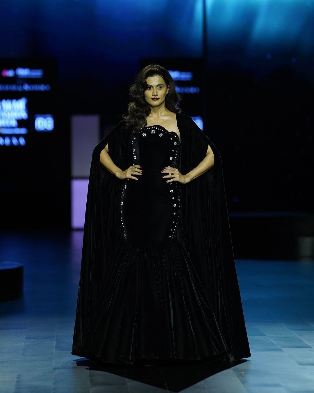 Taapsee Pannu rocked the runway for LG MoodUP™ in Gauri & Nainika for Lakme Fashion Week. She looked stunning in a black dress with a mermaid silhouette.