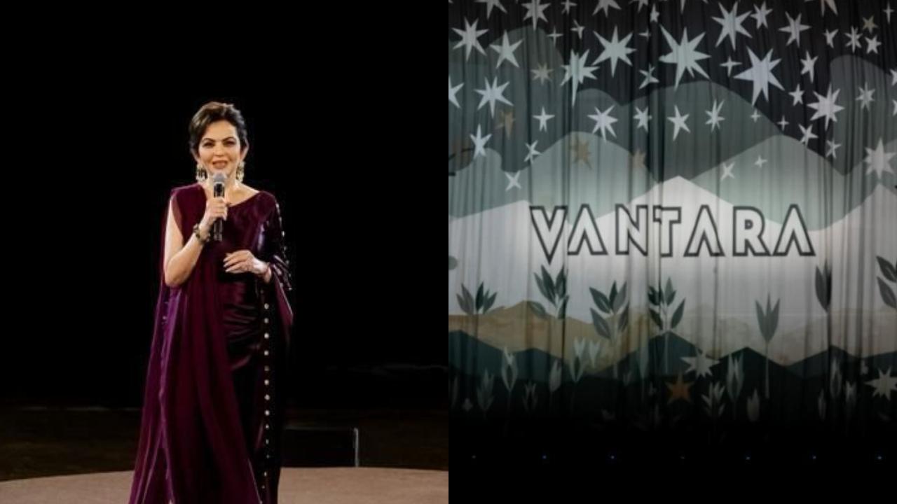Nita Ambani warmly welcomes guests to the Vantara Show, exuding elegance in a stunning wine-colored cocktail dress