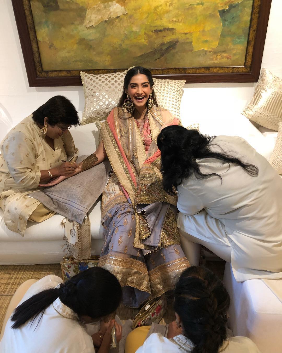 Sonam Kapoor had an intimate yet grand wedding in Mumbai. The actress tied the knot with Anand Ahuja. For her beautiful Mehendi, Sonam wore a sharara set. The actress paired a lilac sharara with a cream kurta and matching dupatta. Her big earrings were the highlight of her look