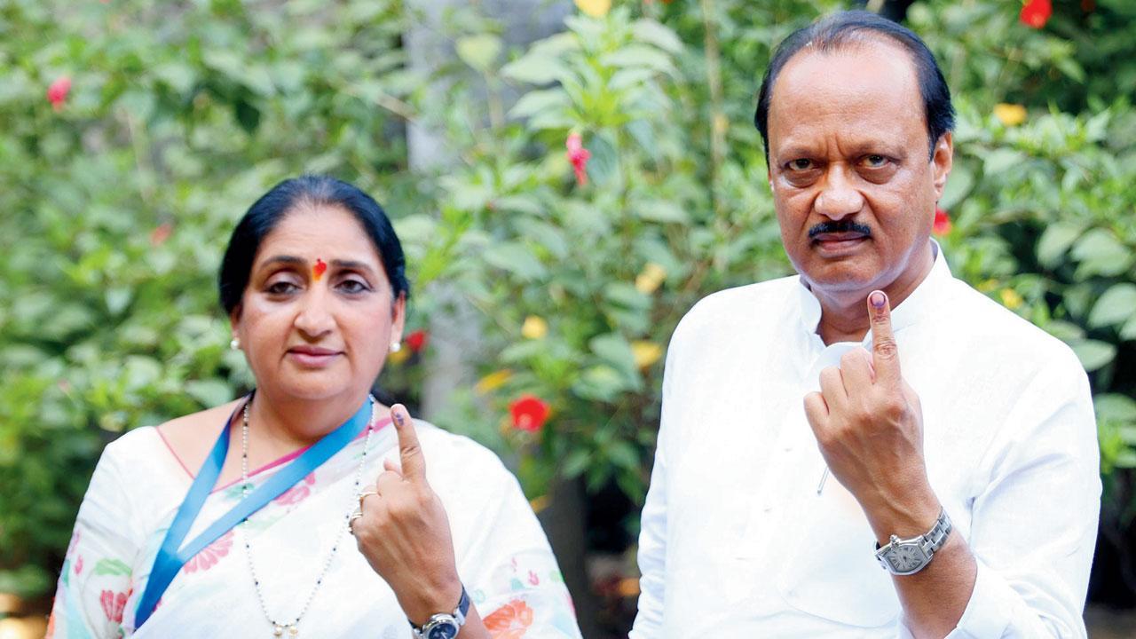 Deputy CM Ajit Pawar and his wife and party candidate from the Baramati constituency, Sunetra, after casting their votes. Pics/PTI