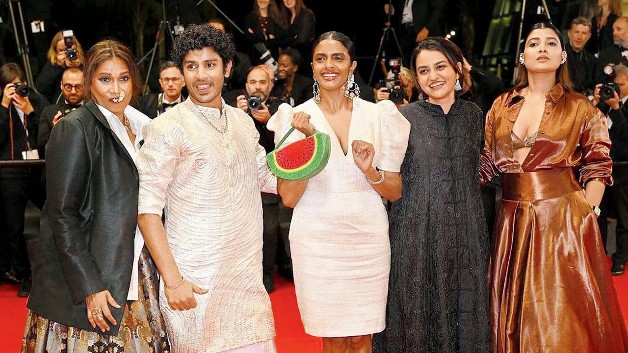 Kadam (left) with the cast and director at the premiere