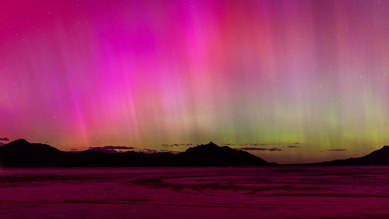 A geomagnetic storm lights up the night sky above the Bonneville Salt Flats on May 10, in Wendover, Utah.