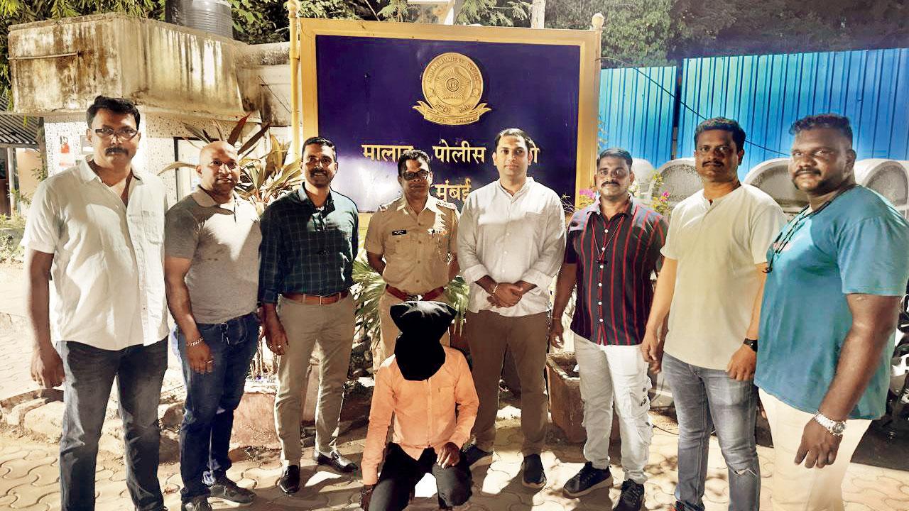 The accused, Baiju Mahadev Mukhiya, with the Malad police