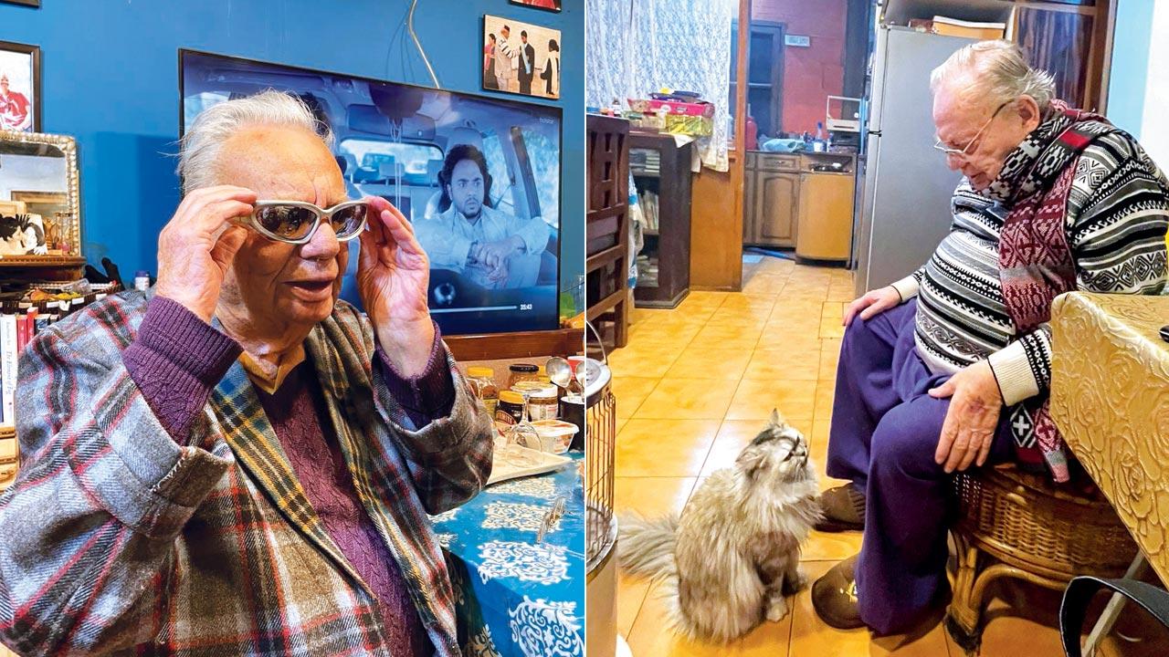 Bond suggests laughing at yourself in the mirror for a  good laugh; (right) With his cat Mimi, who thinks the ball is a mouse
