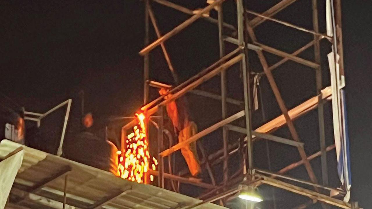 Gigantic billboards being taken down in Ghatkopar
