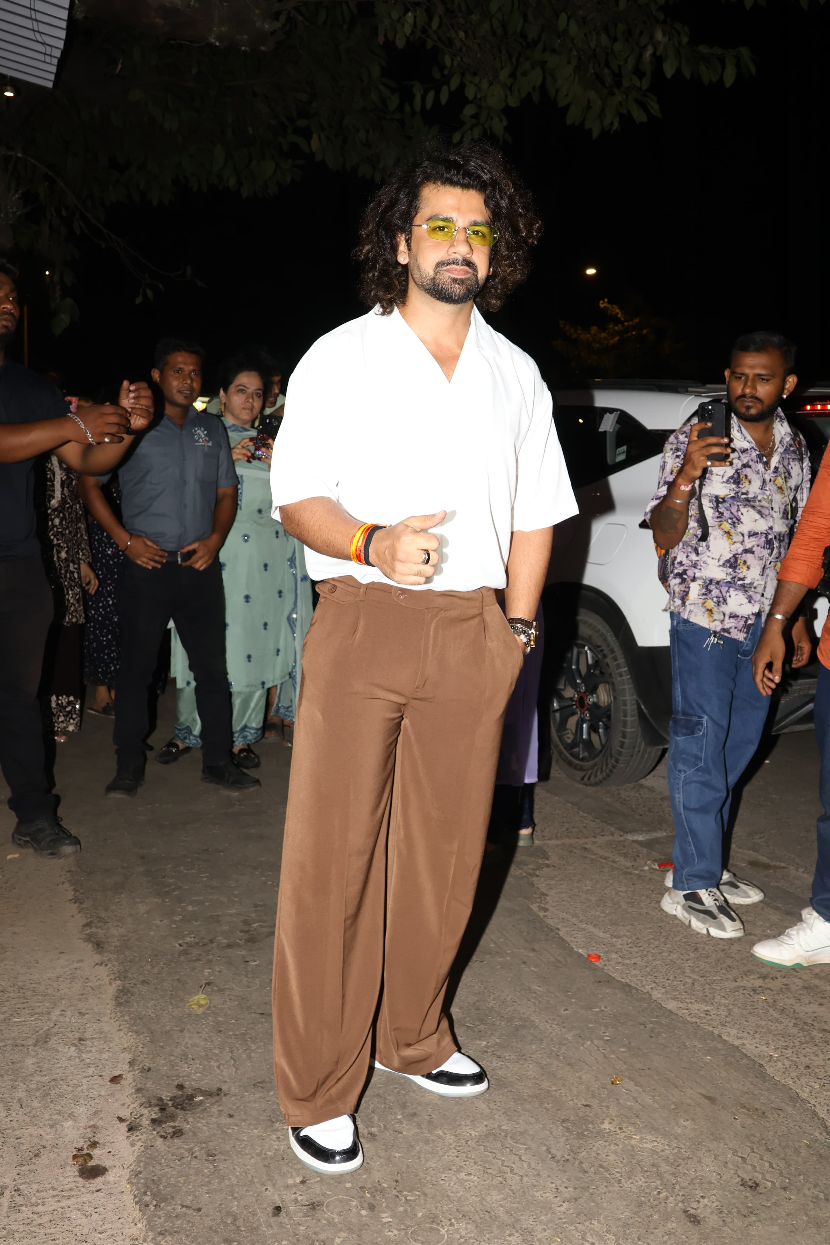 Aashish Mehrotra wore beige pant and white shirt at the grand party