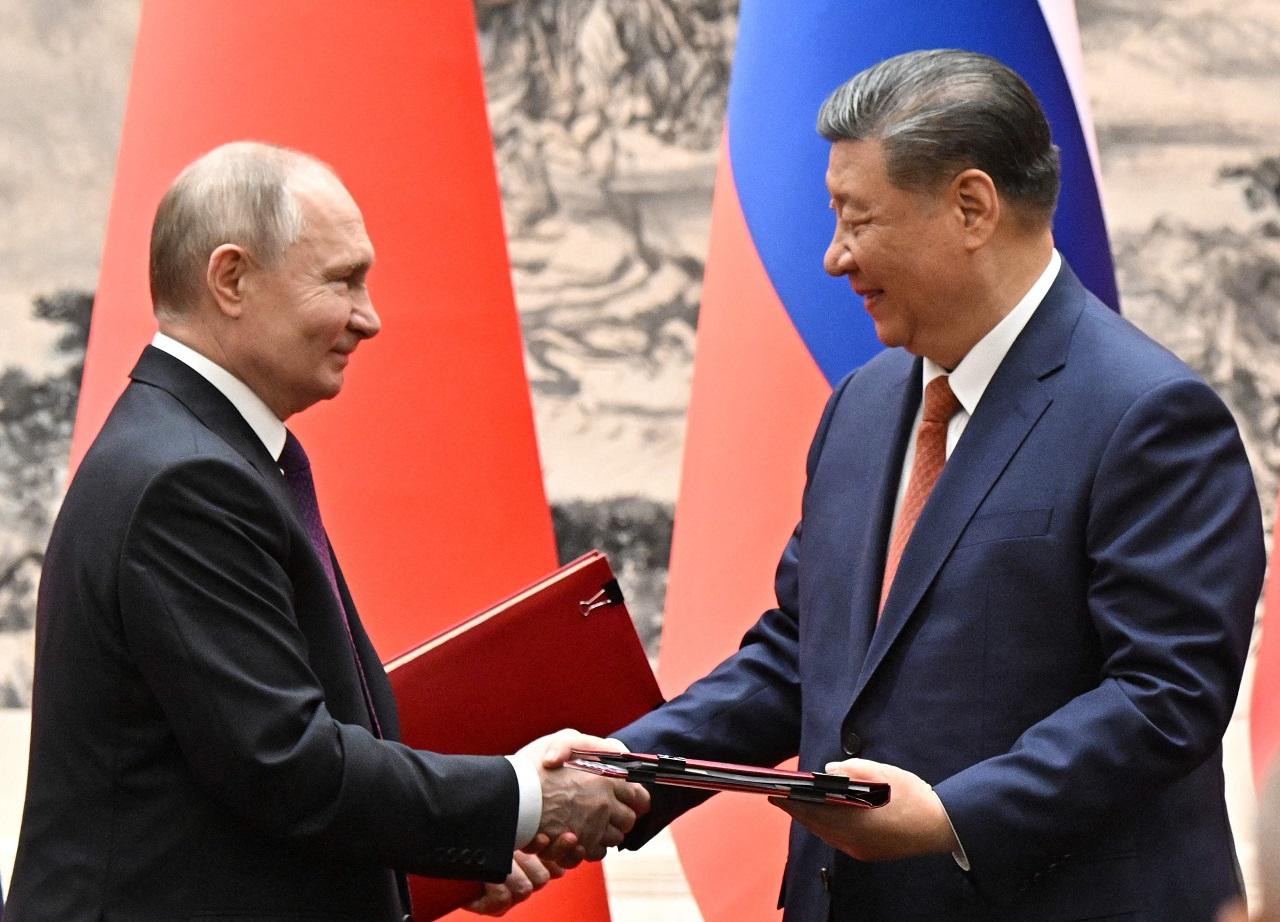 Putin arrived here on his first foreign visit, days after being re-elected for the fifth term in power in the midst of Russia's raging war with Ukraine