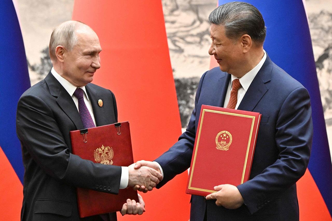 Ushakov said that the most important part of the Beijing talks will be informal in a closed-door setting. In the '1+4 format' on each side, the two leaders will hold substantial talks on Ukraine, he said