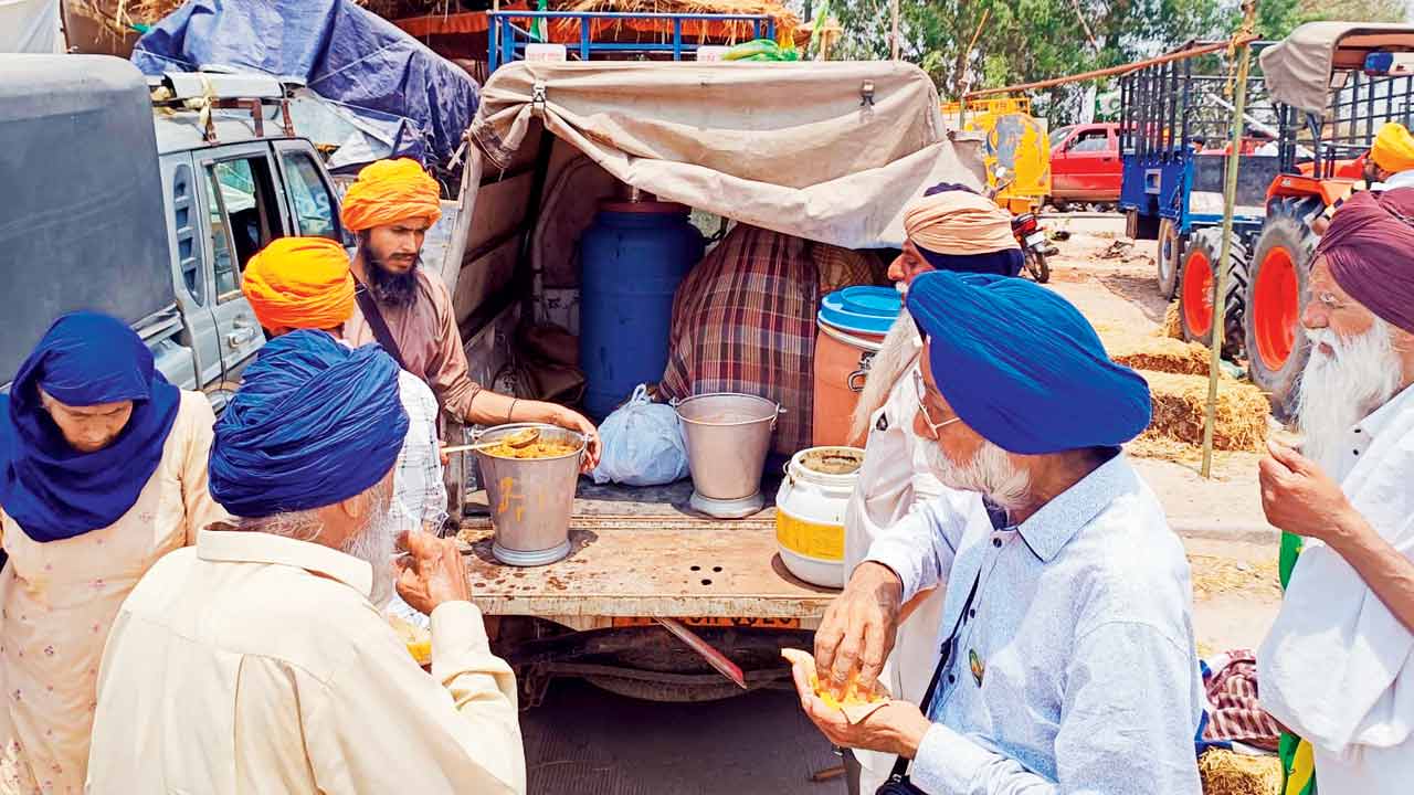 Langar being served to people at the protest site