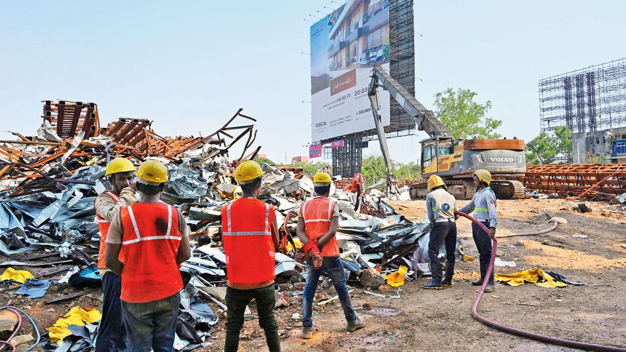 Scenes from the site of the billboard collapse that left 16 dead in Ghatkopar East, on Thursday. Pics/Atul Kamble