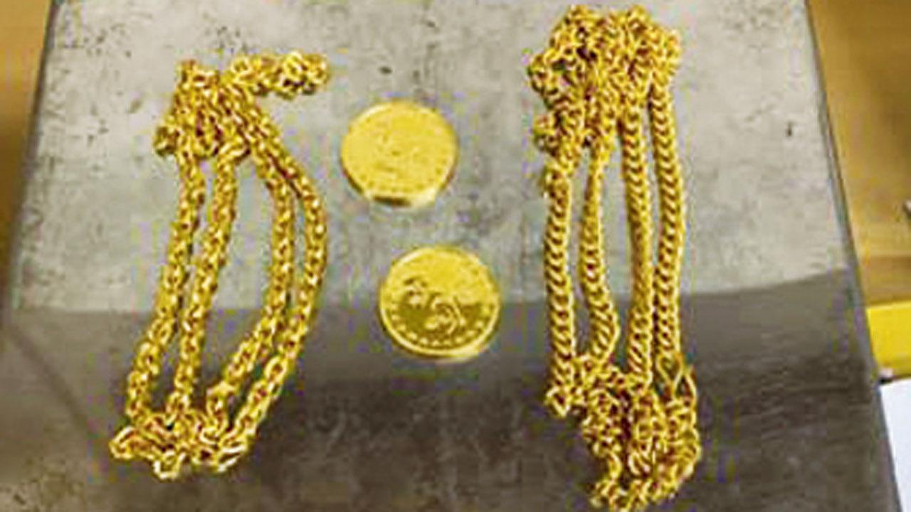 Gold valuables concealed in a jeans pocket