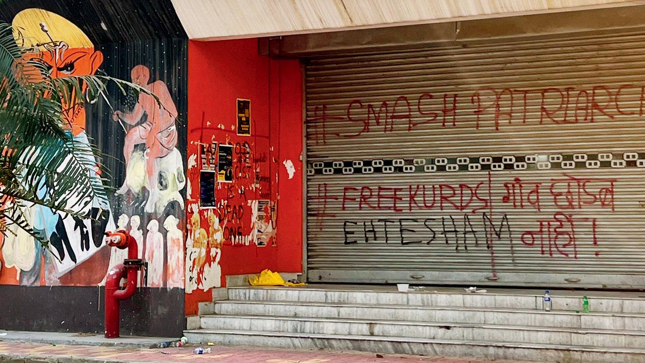 Graffiti on a shutter, ‘smashing patriarchy’