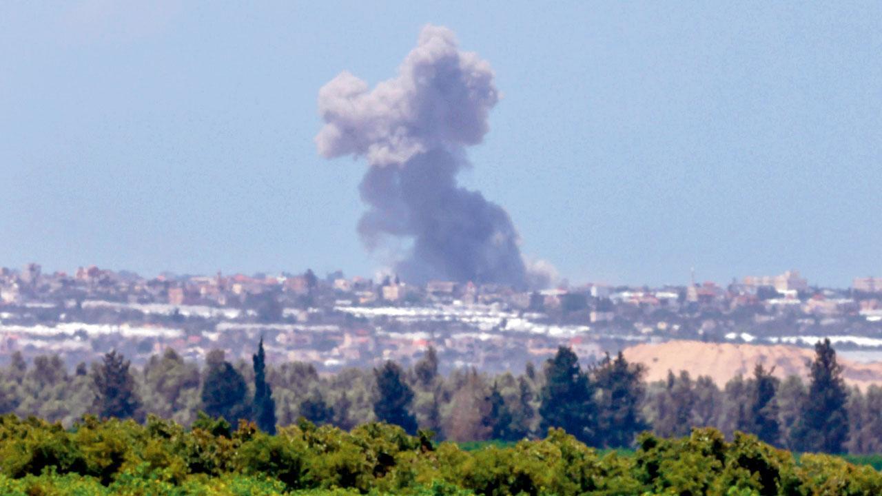 Smoke billows from the southern Gaza Strip during Israeli bombardment. Pic/AFP
