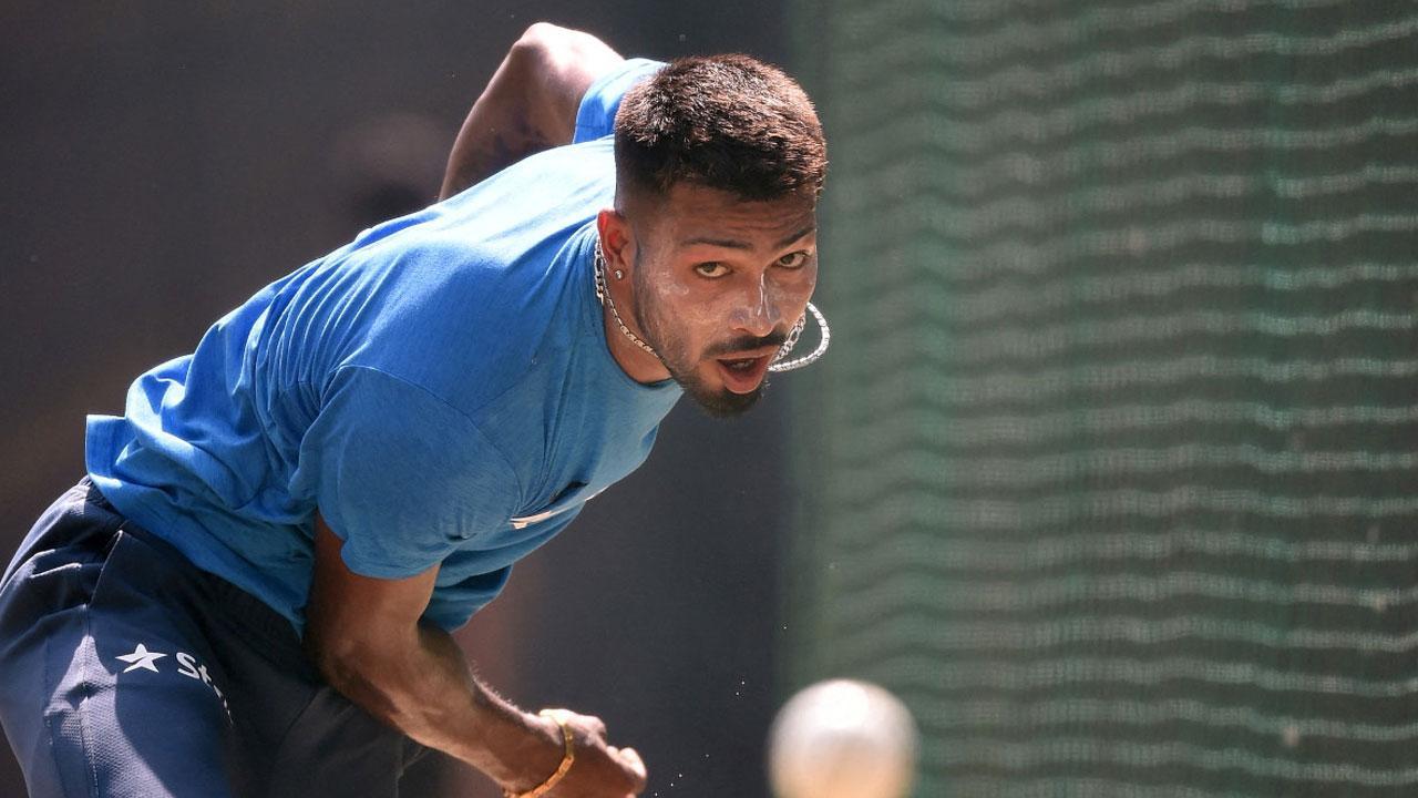 Hardik Pandya bowls in the nets during a training session. Pic/AFP