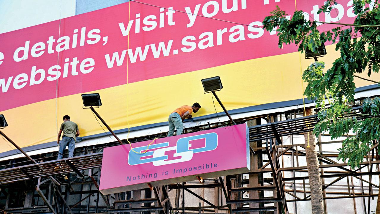 BMC started removing illegal hoarding at the GRP quarters