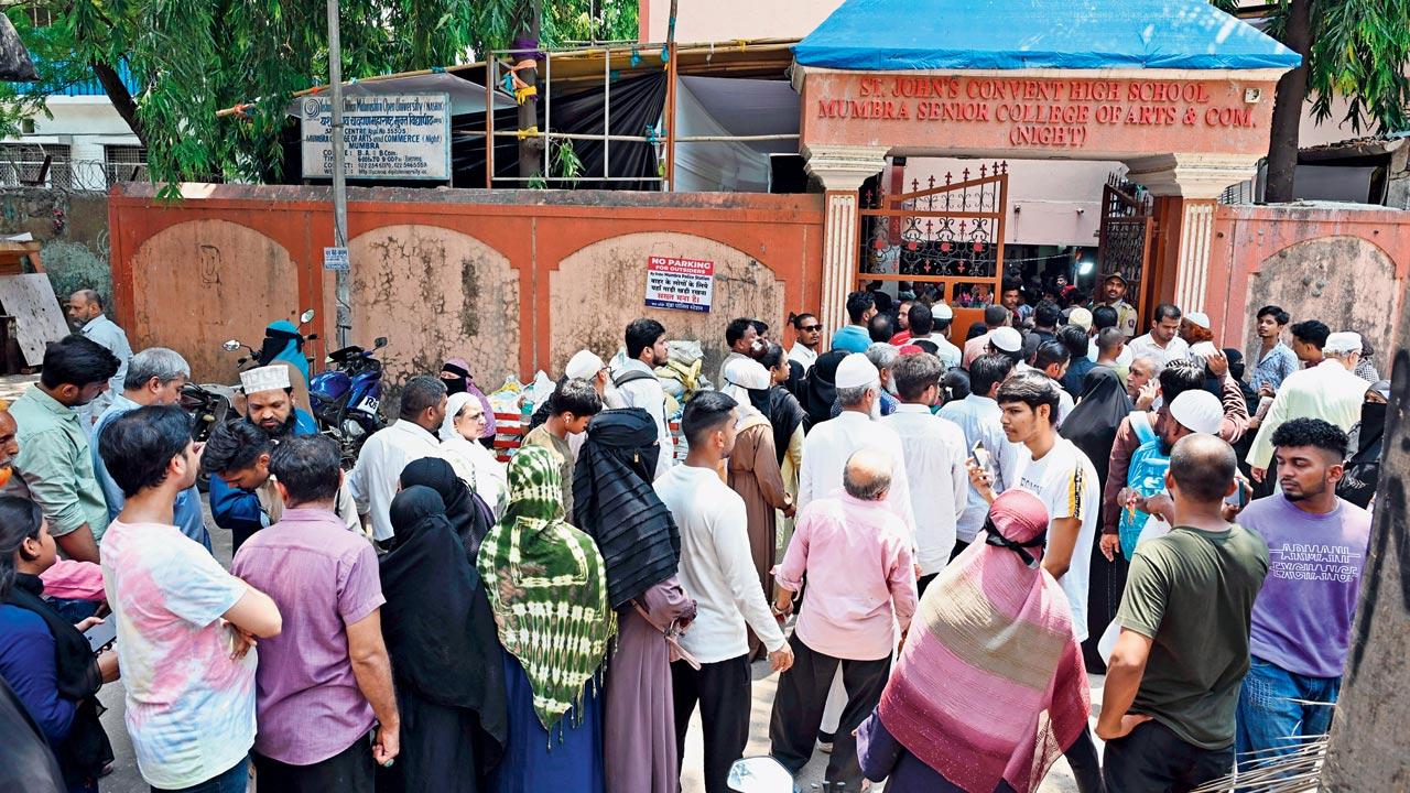 Local residents gathered in large numbers at St John`s Convent High School polling booth in Mumbra