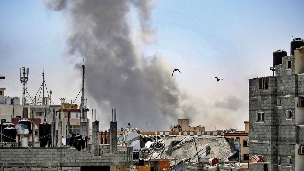 Smoke billows from Israeli strikes in Rafah. Pics/AFP