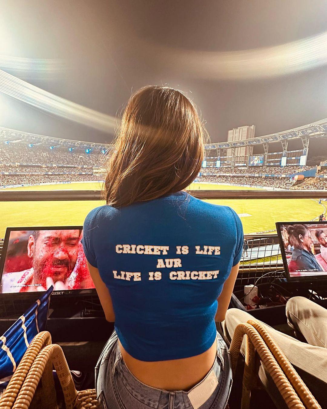 Her crop top had 'Mahi' with jersey number 6 written on the front. While the back of the top has 'Cricket is life aur life is cricket' printed on it