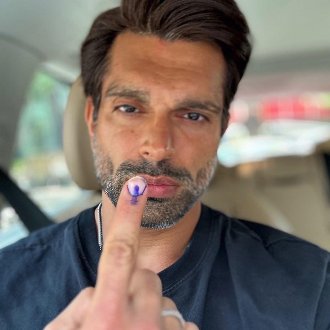 Karan Singh Grover also showed his inked finger as he cast his vote