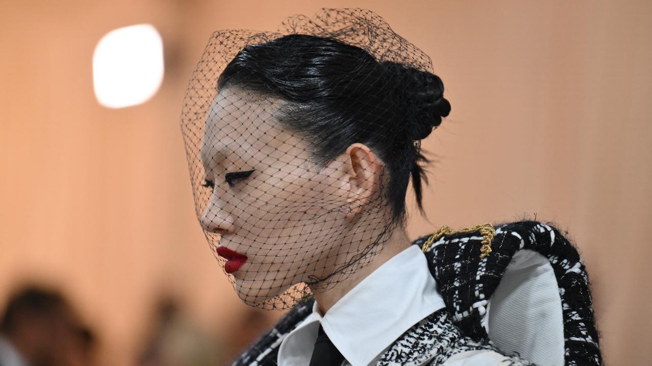 South Korean model Choi So-ra arrives for the 2023 Met Gala at the Metropolitan Museum of Art with a veil adding to the dramatic nature of the event.