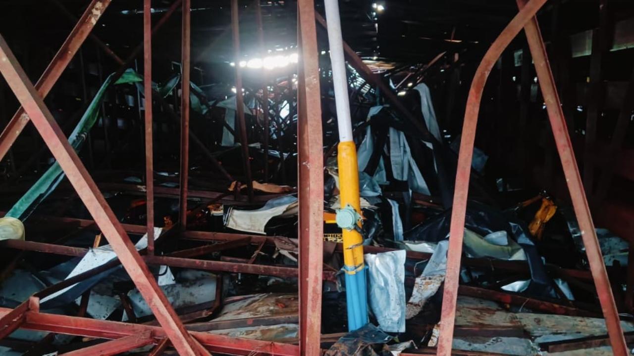 An official said the NDRF can't use gasoline-powered cutters as the accident site is a petrol pump and it can result in a blast or fire