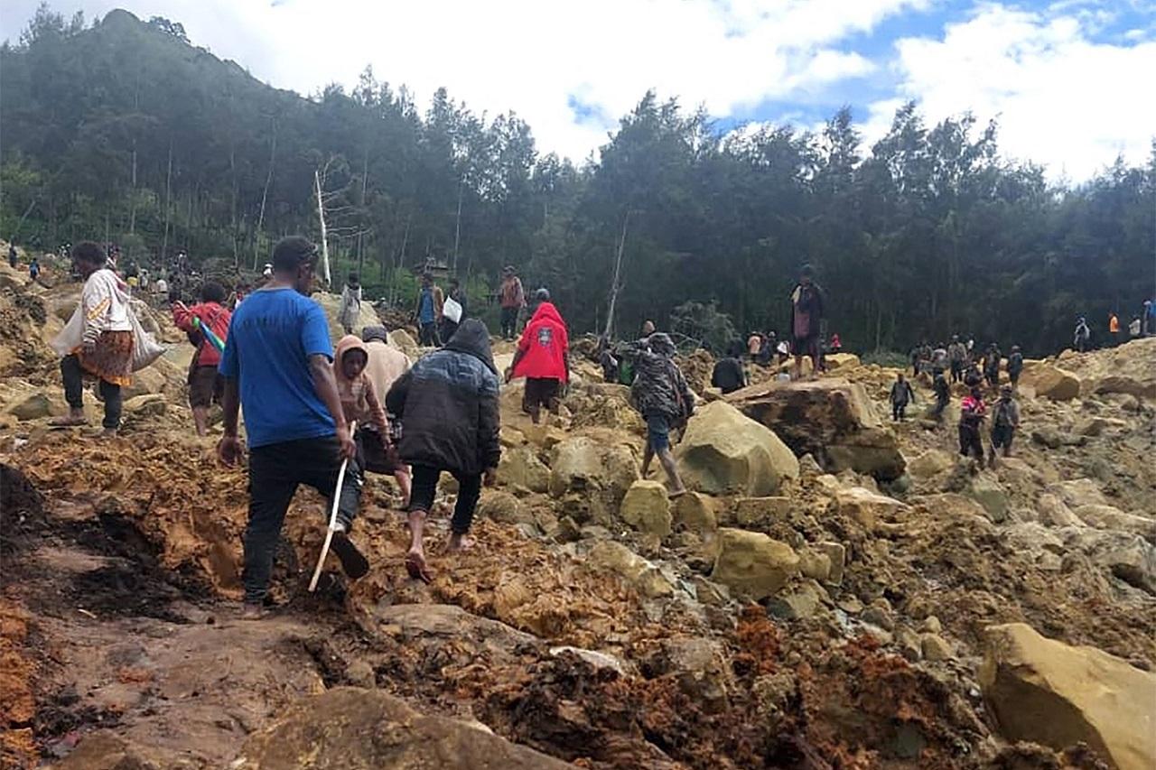 Australia prepared on Monday to send aircraft and other equipment to help at the site of a deadly landslide in Papua New Guinea as overnight rains in the South Pacific nation's mountainous interior raised fears that the tons of rubble that buried hundreds of villagers could become dangerously unstable