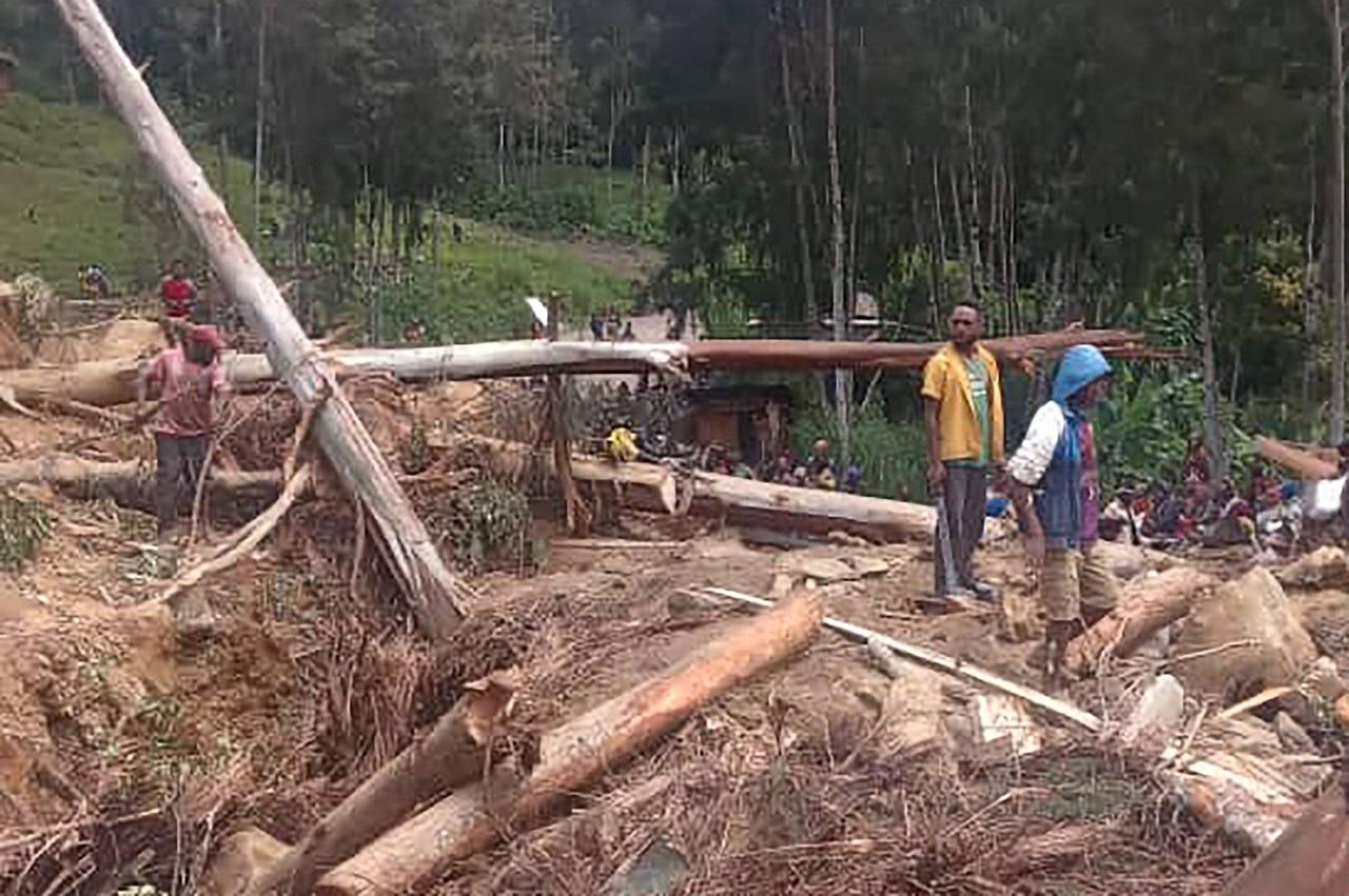 A mass of boulders, earth and splintered trees devastated Yambali in the South Pacific nation's remote highlands when a limestone mountainside sheared away Friday. The blanket of debris has become more unstable with recent rain and streams trapped between the ground and rubble, said Serhan Aktoprak, chief of the International Organisation for Migration's mission in Papua New Guinea