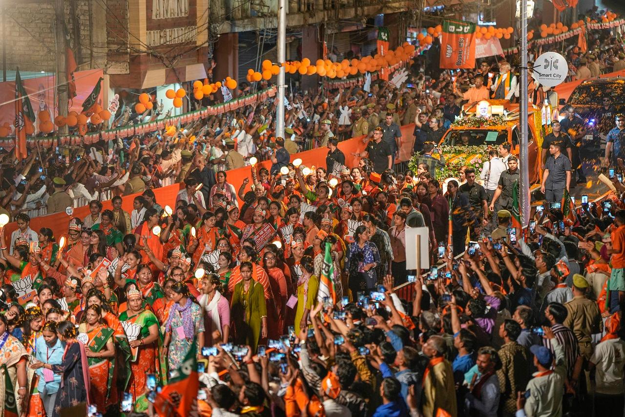 A large crowd cheered for the prime minister and waved cutouts of the BJP's election symbol 'lotus' as he greeted them from his car